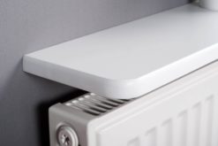White rounded radiator shelf